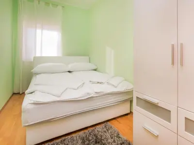 Krevet ili kreveti u jedinici u objektu Holiday Home Joy on Countryside by Interhome
