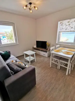 TV i/ili zabavni centar u objektu Apartment Roman