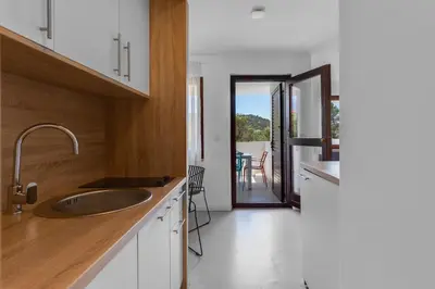 Kuhinja ili čajna kuhinja u objektu Apartments Jezera Lovišća