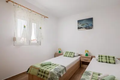 Krevet ili kreveti u jedinici u objektu Apartments Ivan