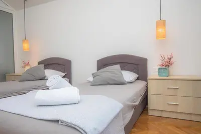 Krevet ili kreveti u jedinici u objektu APARTMANI SLAMIĆ