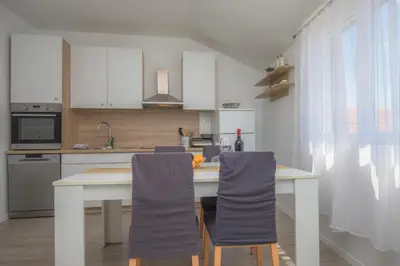 Kuhinja ili čajna kuhinja u objektu APARTMANI SLAMIĆ
