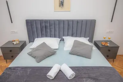 Krevet ili kreveti u jedinici u objektu APARTMANI SLAMIĆ