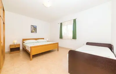Krevet ili kreveti u jedinici u objektu Apartmani Mares Ražanj