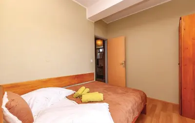 Krevet ili kreveti u jedinici u objektu Apartmani Mirjana