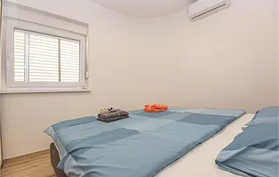 Krevet ili kreveti u jedinici u objektu Beach Front Apartment In Brodarica With Wifi