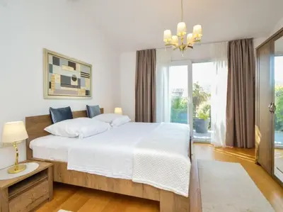 Krevet ili kreveti u jedinici u objektu Villa Bloom Garden