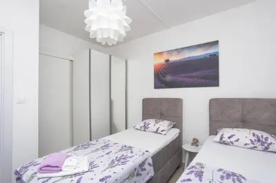 Krevet ili kreveti u jedinici u objektu Dalma Residence apartman Lavandella