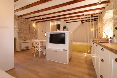 TV i/ili zabavni centar u objektu Old Šibenik Cozy Design Apartment