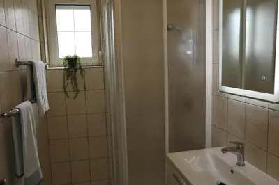 Kupaonica u objektu Apartmani Delač