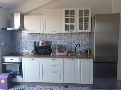 Kuhinja ili čajna kuhinja u objektu Muring Apartments
