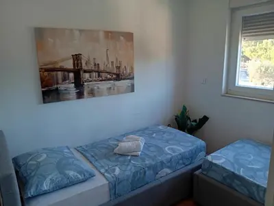 Krevet ili kreveti u jedinici u objektu Braco apartments by the sea with a sea view