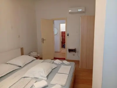 Krevet ili kreveti u jedinici u objektu Braco apartments by the sea with a sea view