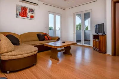 TV i/ili zabavni centar u objektu Apartments Juro