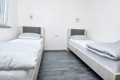Krevet ili kreveti u jedinici u objektu Apartments Juro