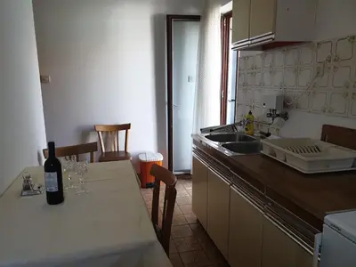 Kuhinja ili čajna kuhinja u objektu Assato Retro Apartment