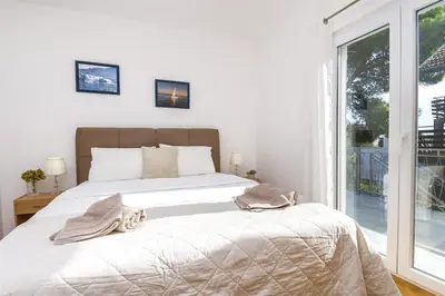 Krevet ili kreveti u jedinici u objektu Apartments Ria Vodice