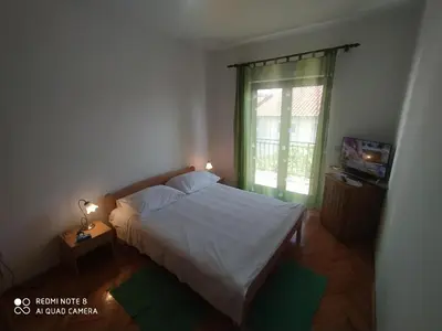 Krevet ili kreveti u jedinici u objektu Apartments Luca
