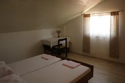 Krevet ili kreveti u jedinici u objektu Apartmani Iva