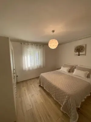 Krevet ili kreveti u jedinici u objektu Comfy apartment in a quiet neighborhood