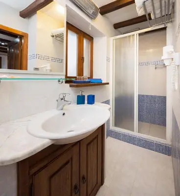 Kupaonica u objektu Harbour Holiday Home 