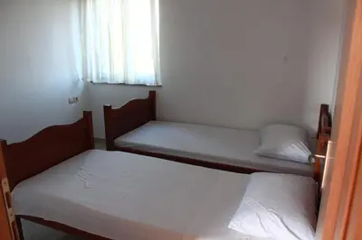 Krevet ili kreveti u jedinici u objektu Apartments with parking space Rogoznica - 19064
