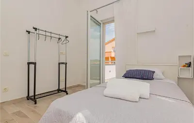 Krevet ili kreveti u jedinici u objektu 2 Bedroom Amazing Apartment In Bilice