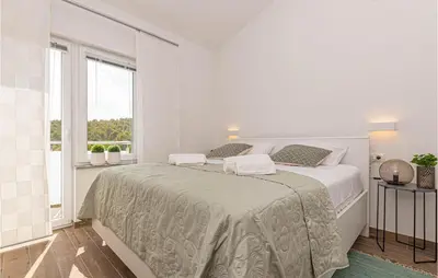 Krevet ili kreveti u jedinici u objektu 2 Bedroom Amazing Apartment In Bilice