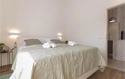 Krevet ili kreveti u jedinici u objektu 2 Bedroom Amazing Apartment In Bilice