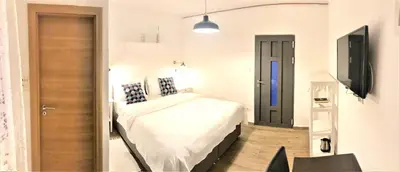 Krevet ili kreveti u jedinici u objektu Apartments & Rooms Formenti