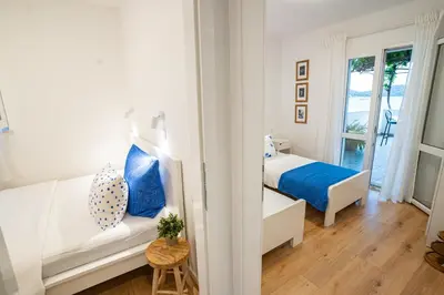 Krevet ili kreveti u jedinici u objektu Apartmani Bilonic Rogoznica