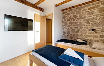 Krevet ili kreveti u jedinici u objektu Cozy Home In Kaprije With Kitchen