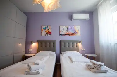 Krevet ili kreveti u jedinici u objektu Villa Lumaka Sun - Amazing Home In Brodarica with 4 Bedrooms, Wifi, Outdoor Swimming Pool and Heated Swimming Pool