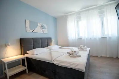 Krevet ili kreveti u jedinici u objektu Villa Lumaka Sun - Amazing Home In Brodarica with 4 Bedrooms, Wifi, Outdoor Swimming Pool and Heated Swimming Pool