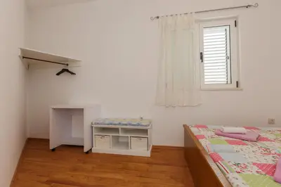 Krevet ili kreveti u jedinici u objektu Apartments Rogulj