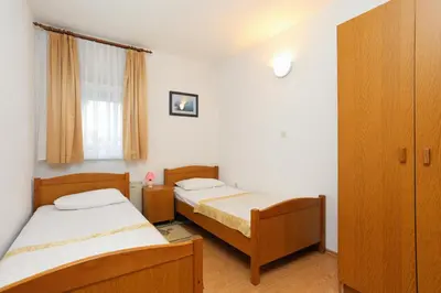 Krevet ili kreveti u jedinici u objektu Apartments by the sea Rogoznica - 4162