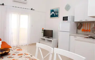 Kuhinja ili čajna kuhinja u objektu Lovely Apartment In Zecevo Rogoznicko