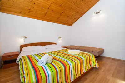 Krevet ili kreveti u jedinici u objektu Apartments Family corner