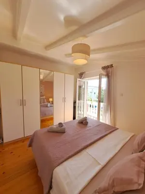 Krevet ili kreveti u jedinici u objektu Apartments Nicole
