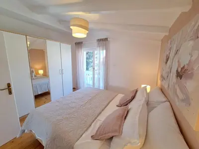 Krevet ili kreveti u jedinici u objektu Apartments Nicole