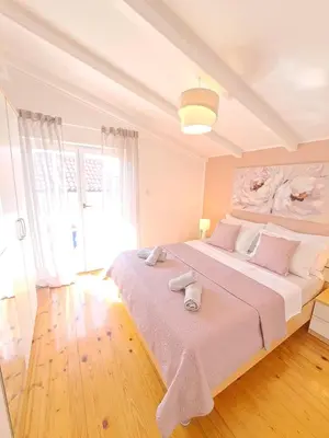 Krevet ili kreveti u jedinici u objektu Apartments Nicole