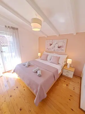 Krevet ili kreveti u jedinici u objektu Apartments Nicole