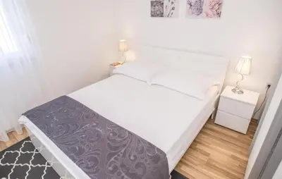 Krevet ili kreveti u jedinici u objektu Luxurious Home In Unesic With Sauna