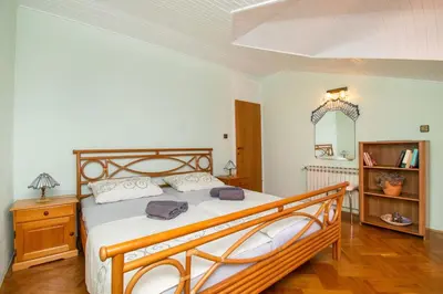 Krevet ili kreveti u jedinici u objektu Apartments and Room Agiss with pool