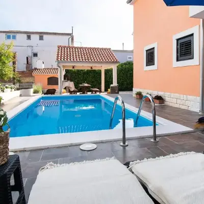 Apartments and Room Agiss with pool