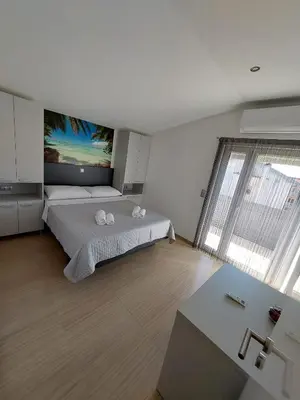 Krevet ili kreveti u jedinici u objektu Apartmani Tropical