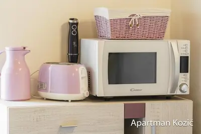 TV i/ili zabavni centar u objektu Apartmani Kozić