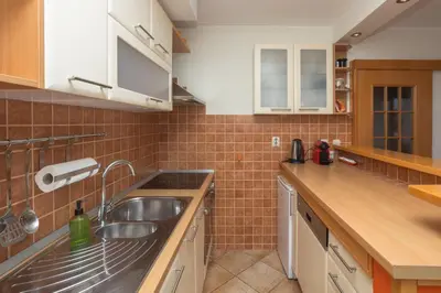 Kuhinja ili čajna kuhinja u objektu Dalma Residence apartman Girandella