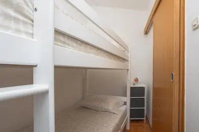 Krevet ili kreveti u jedinici u objektu Dalma Residence apartman Girandella