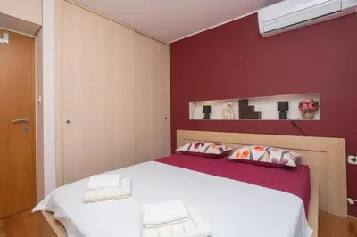 Krevet ili kreveti u jedinici u objektu Dalma Residence apartman Girandella